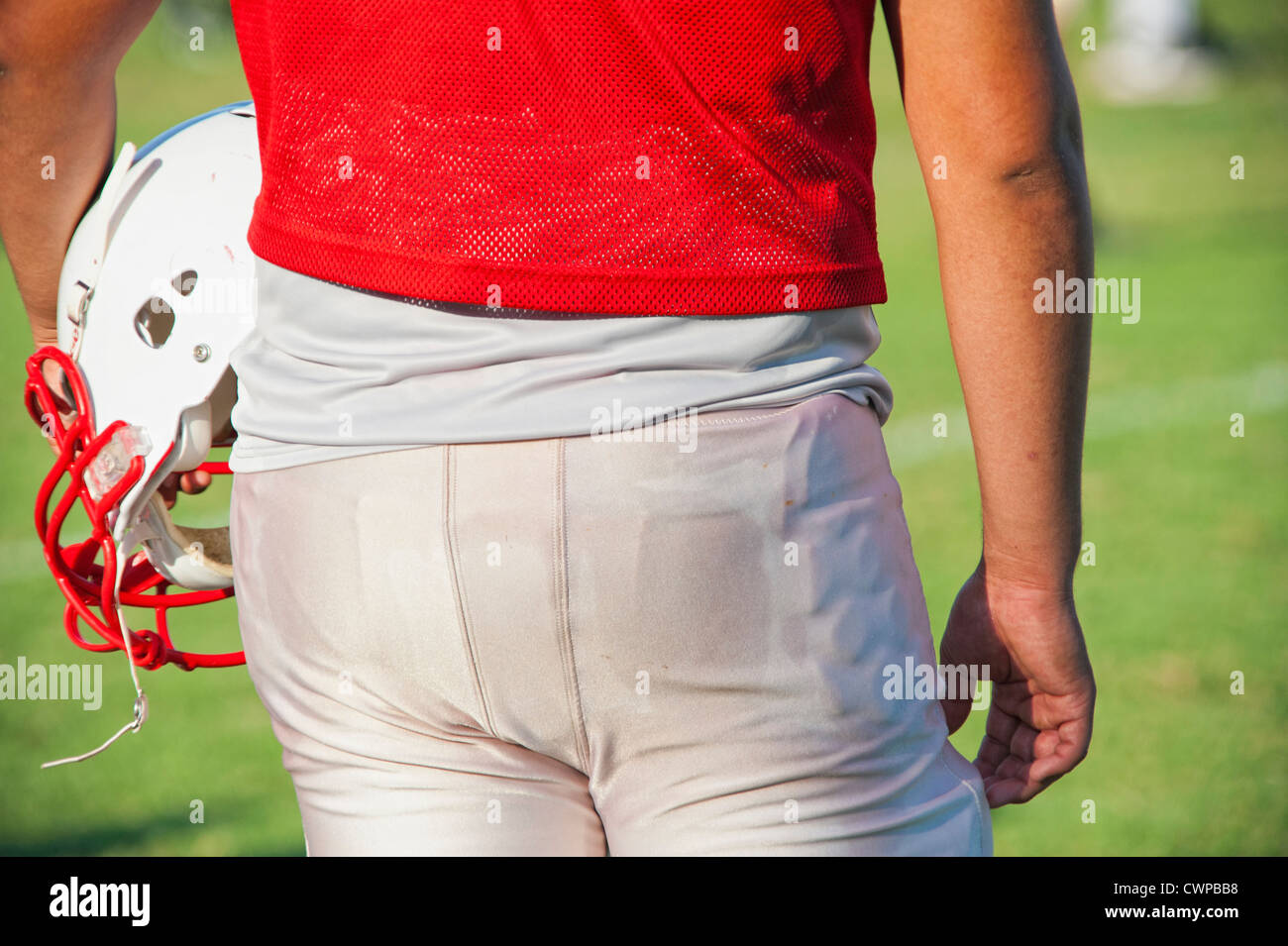 Lato posteriore della sezione centrale del giocatore di football americano Foto Stock