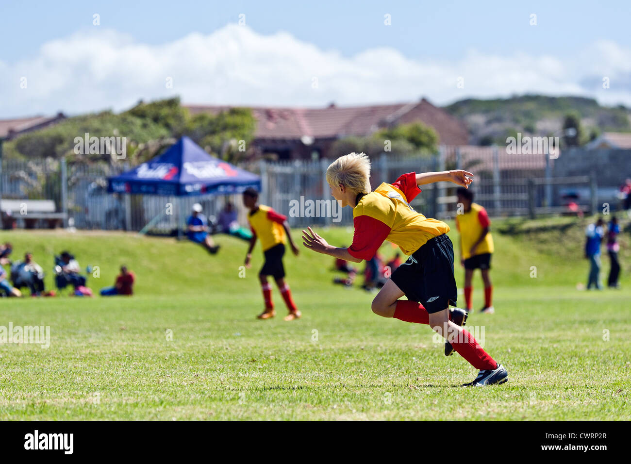 Football team di giovani al torneo Strandfontain, Cape Town, Sud Africa Foto Stock