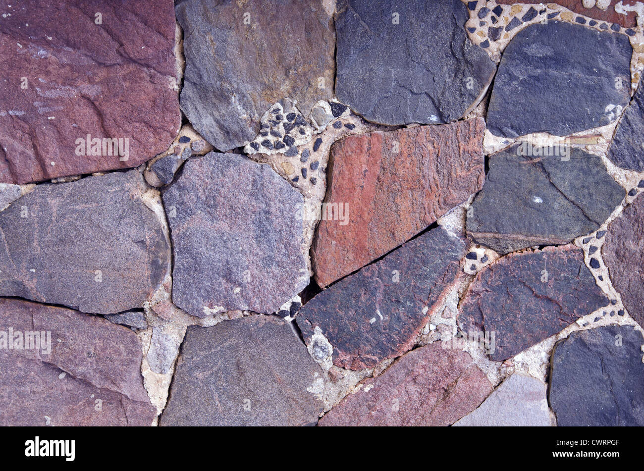 Muro di grandi pezzi di pietra. Architectural muro di pietra dello sfondo. Foto Stock