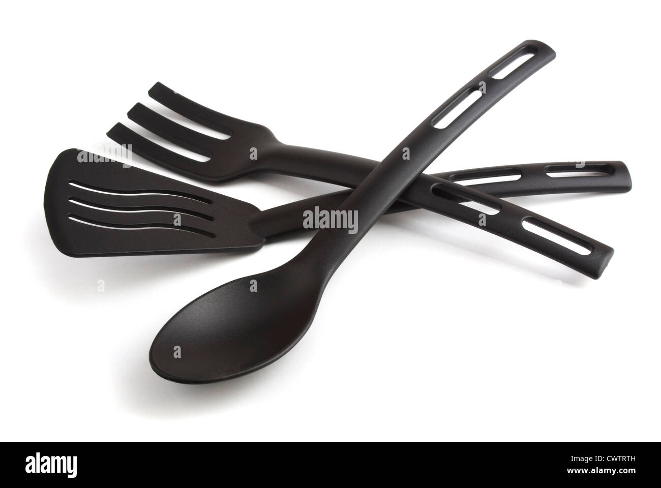 In plastica nera utensili da cucina isolato su bianco Foto Stock