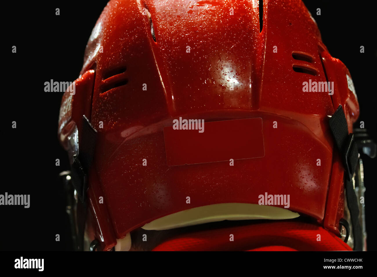 Hockey su ghiaccio giocatore posteriore del casco Foto Stock