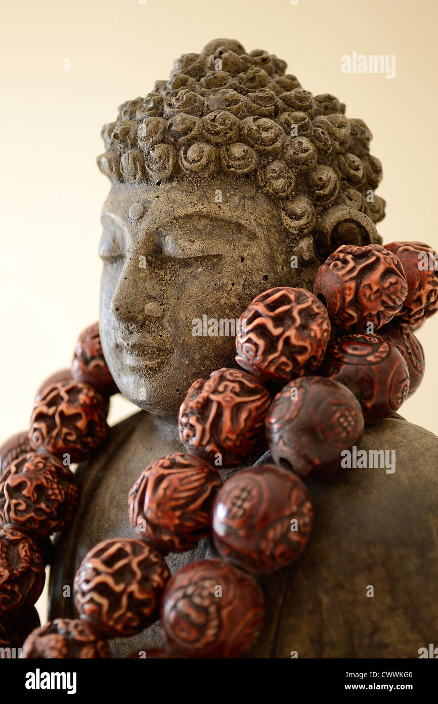 Una scultura di Buddha Foto Stock