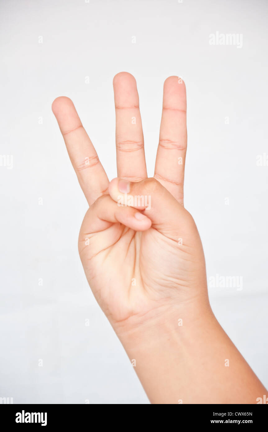 Il movimento con tre dita da bambini Foto Stock
