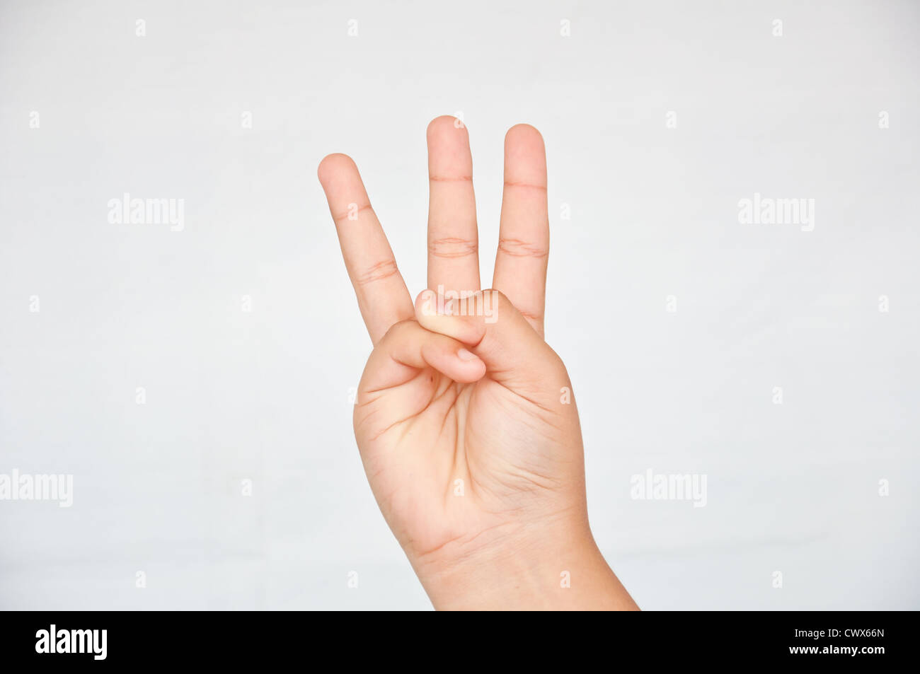 Tre dito dalla mano dei bambini Foto Stock