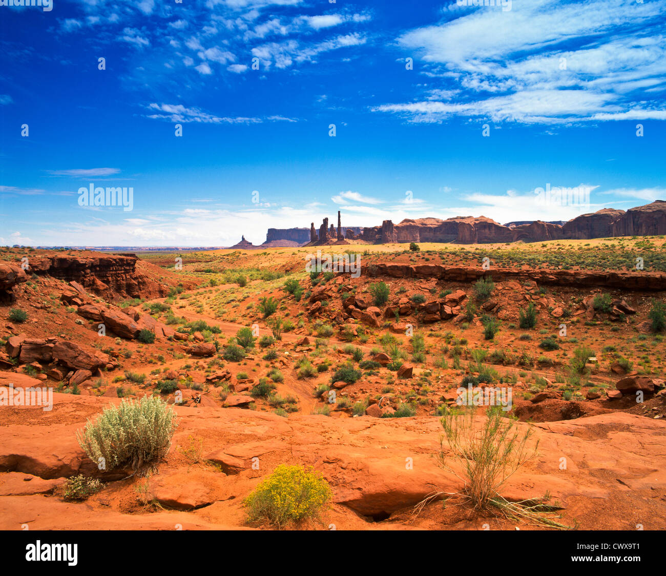 Yei Bi Chei, Totem, Tse Biyi Yazzie e cacce Mesa. Nello stato di Washington a secco Il Monument Valley Tribal Park. Foto Stock