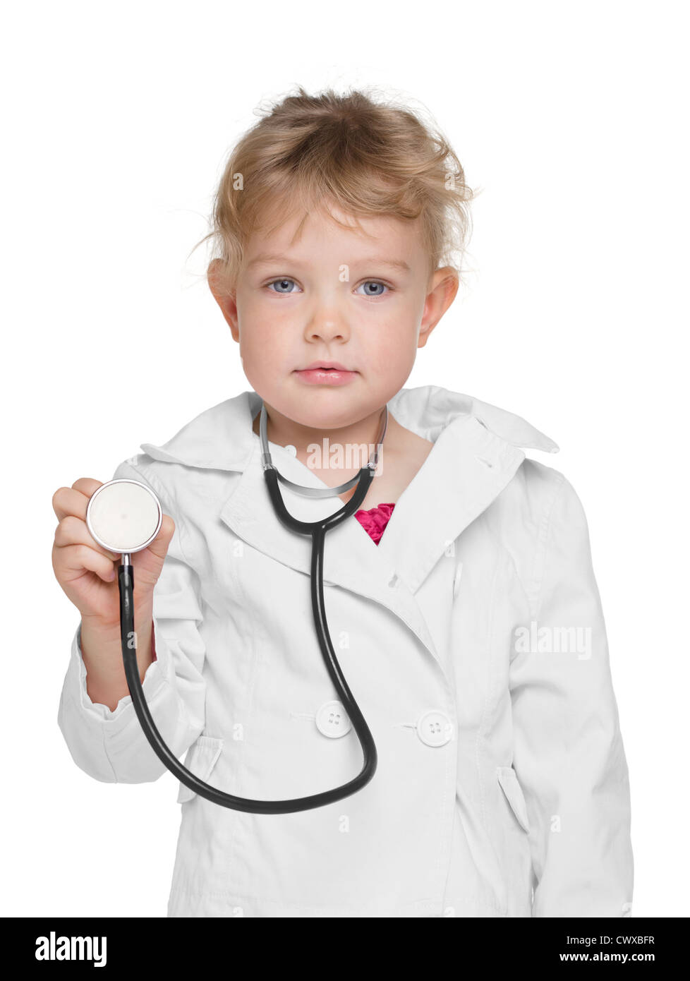 Un adorabile bambina riproduzione medico su bianco Foto Stock