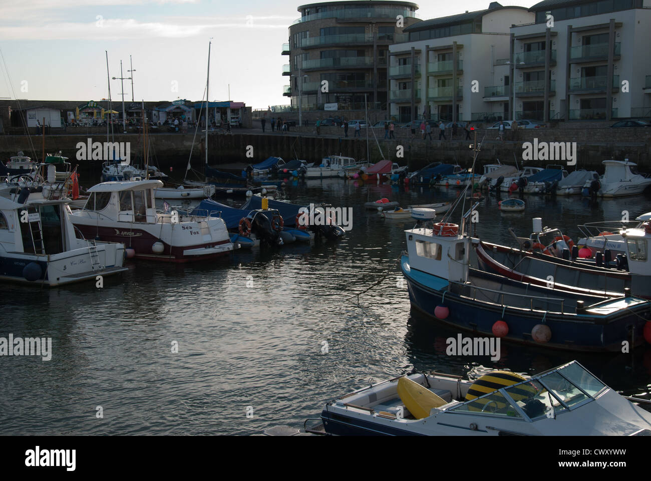 Barche nel porto west bay Foto Stock