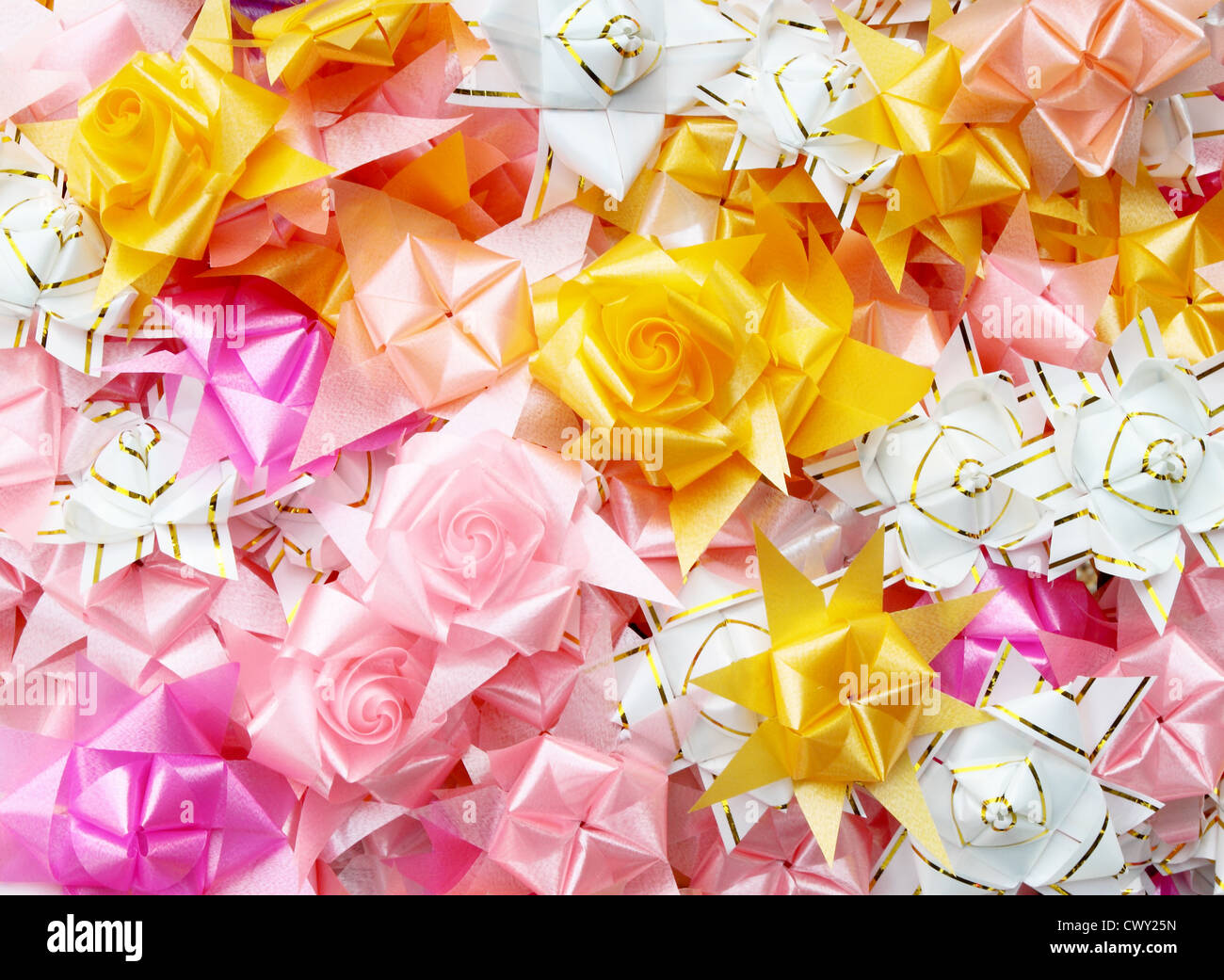 Il colore di sfondo del dono nastri e fiori Foto Stock