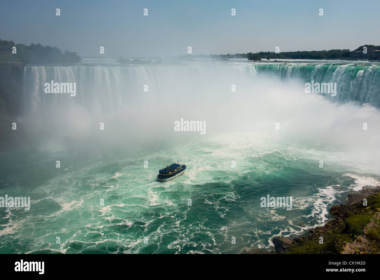 Tour in Barca ai piedi delle cascate Horseshoe Foto Stock
