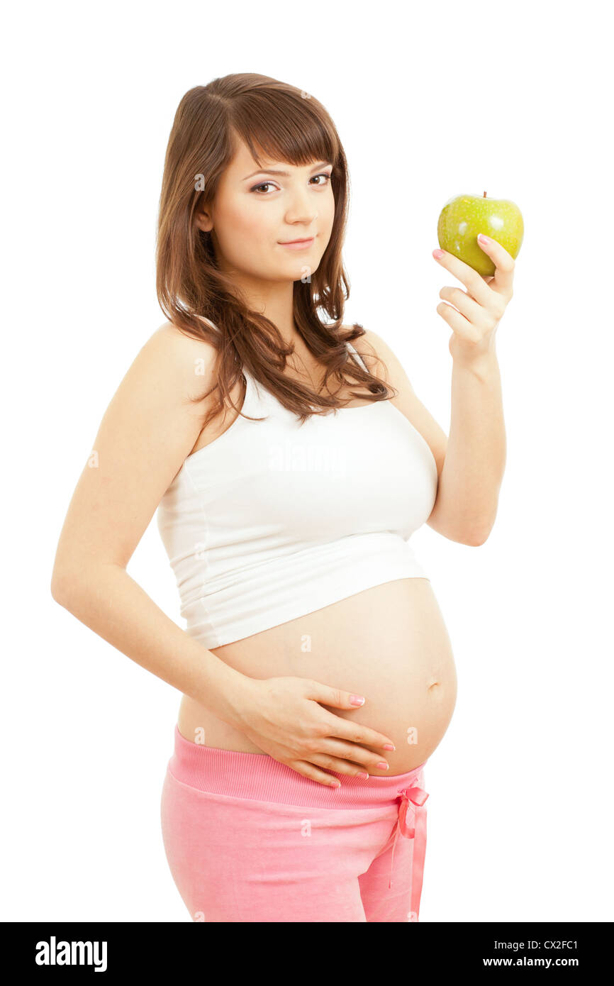Donna incinta di mangiare cibo sano Foto Stock