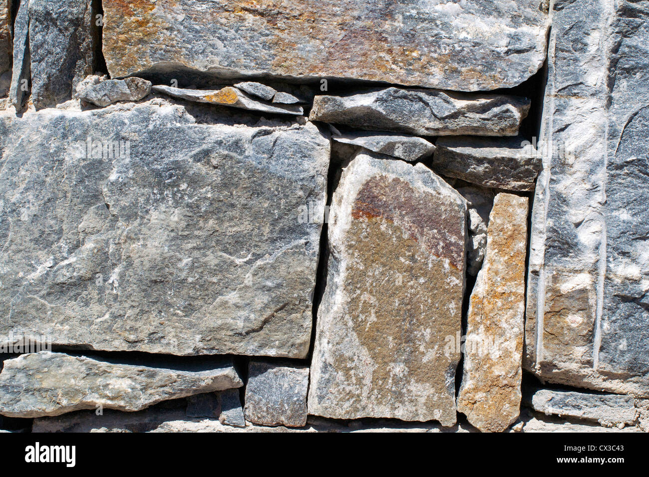 Una pietra di granito a parete, Granito di Corsica Foto Stock