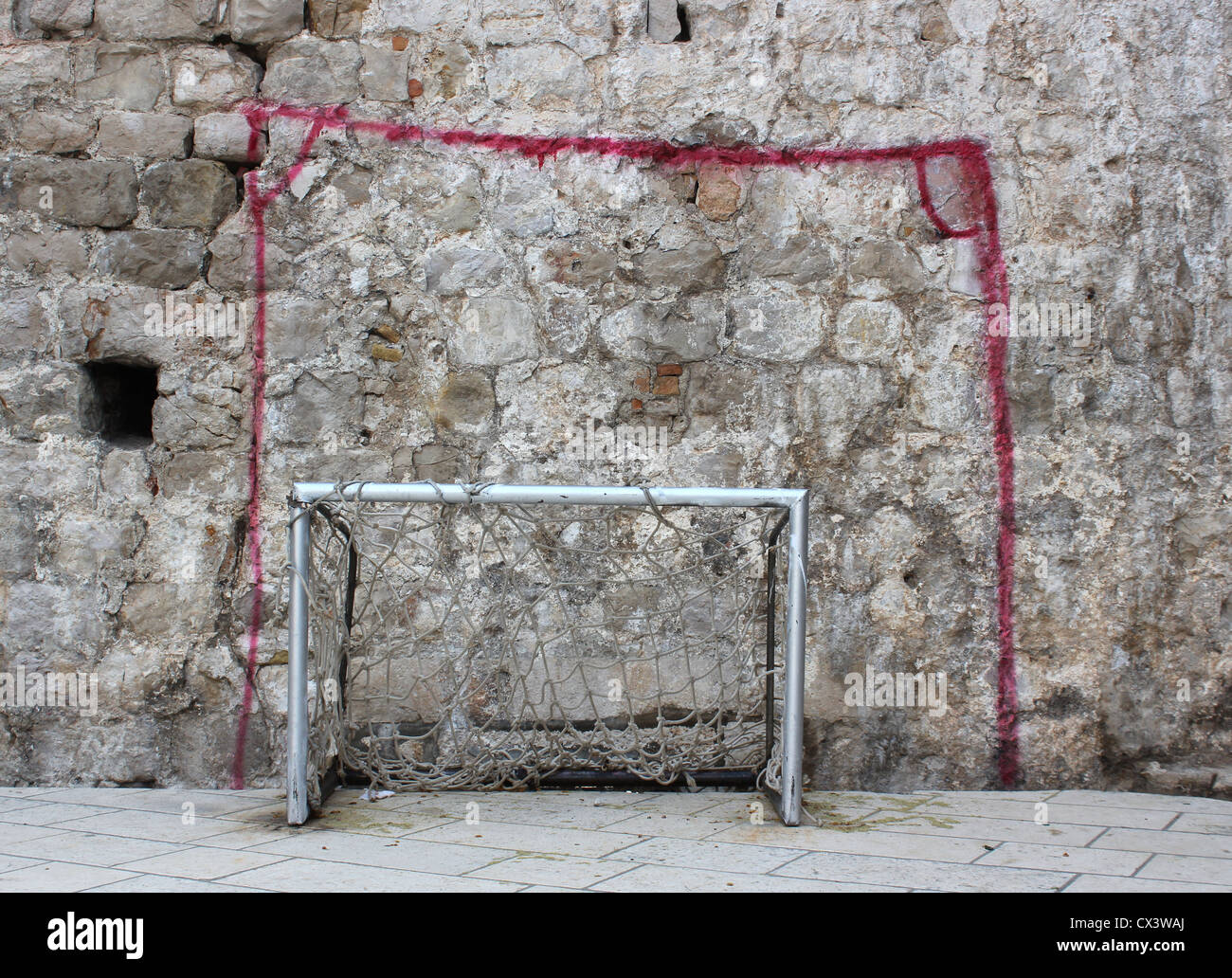 Dipinto e reale delle regole del gioco - Strada del gioco del calcio Foto Stock