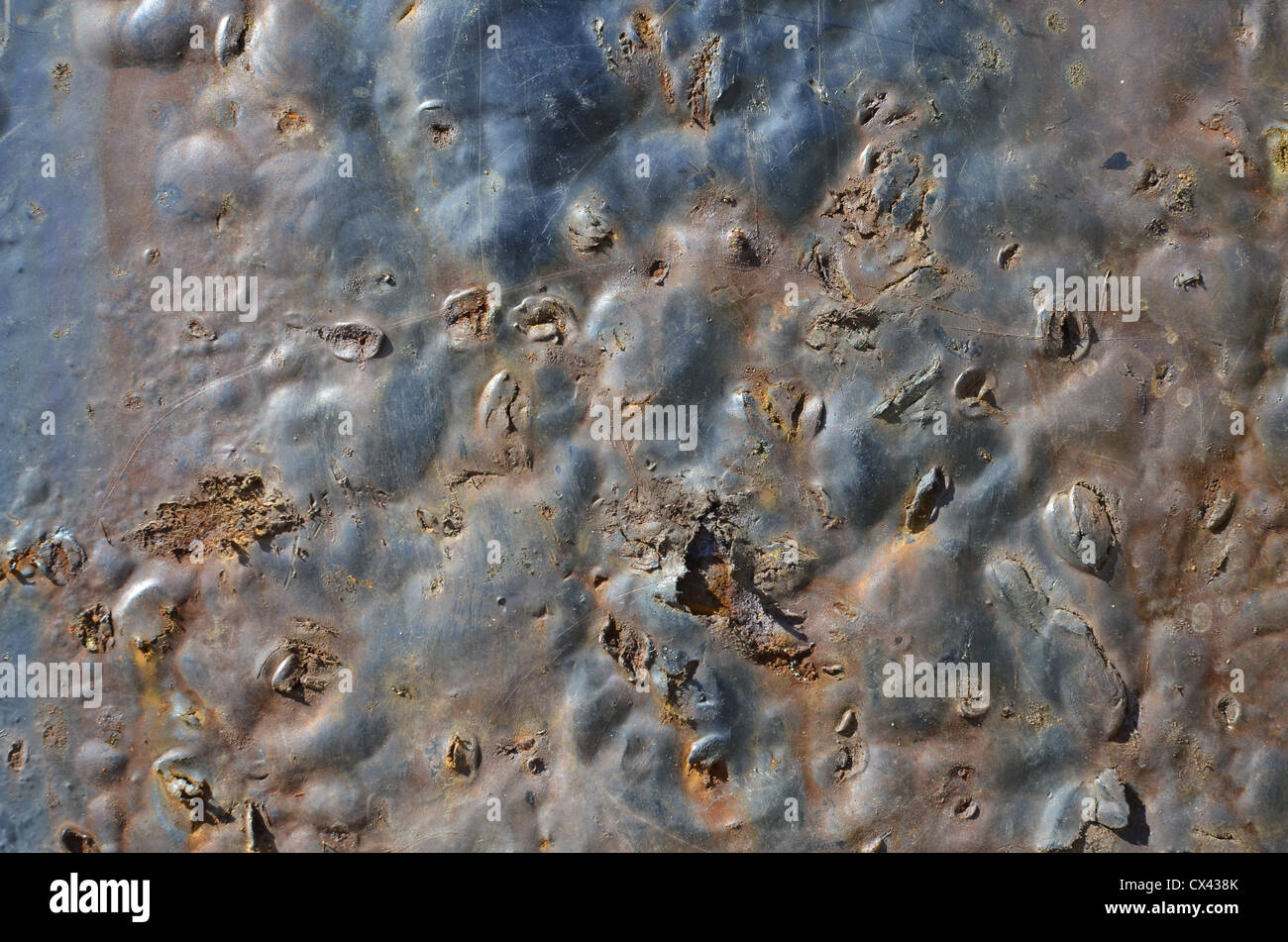 Struttura in metallo arrugginito astratta. Blu e arancio di arrugginimento / decadimento ferro Foto Stock