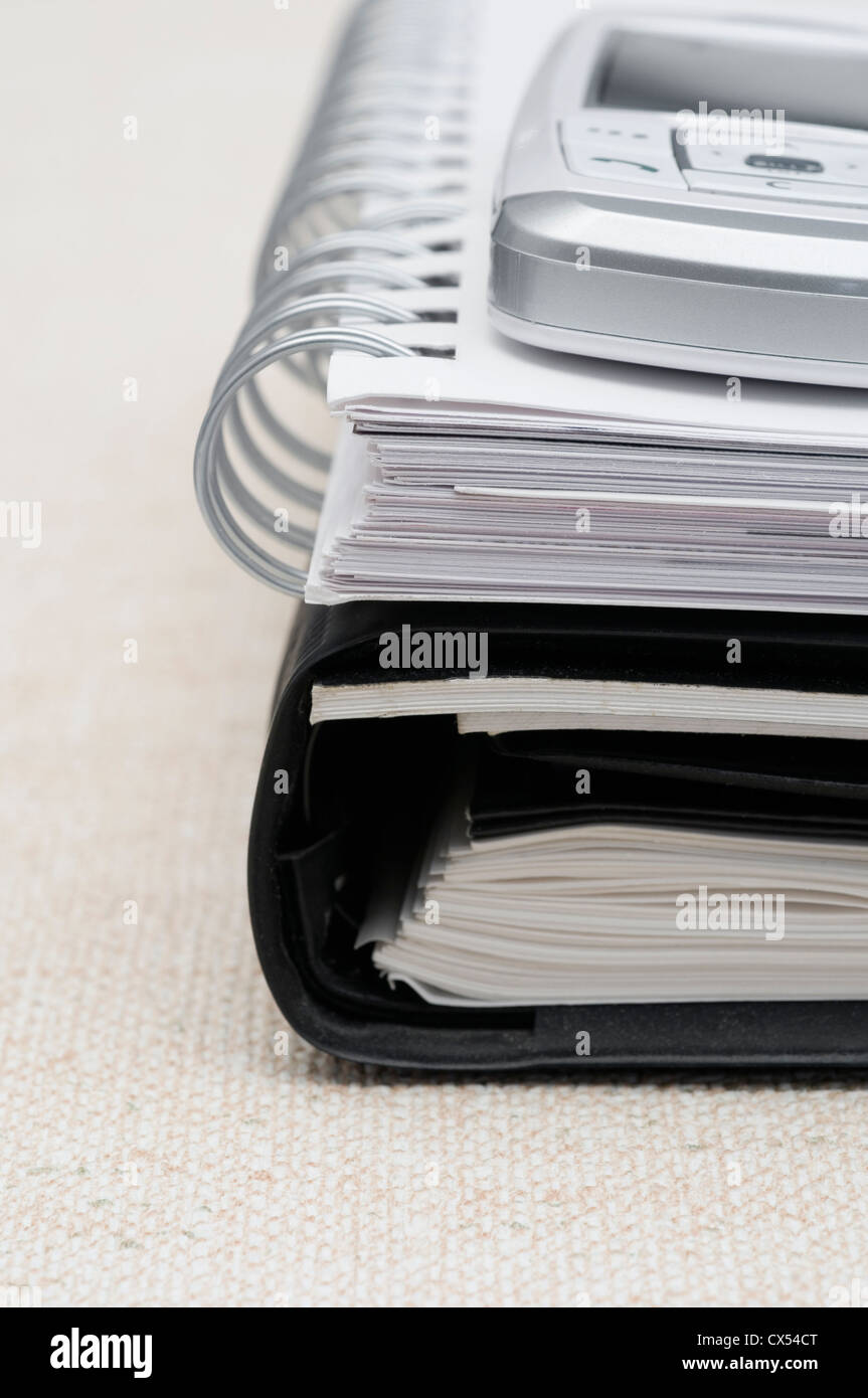 Notebook, Day planner e cellulare Foto Stock