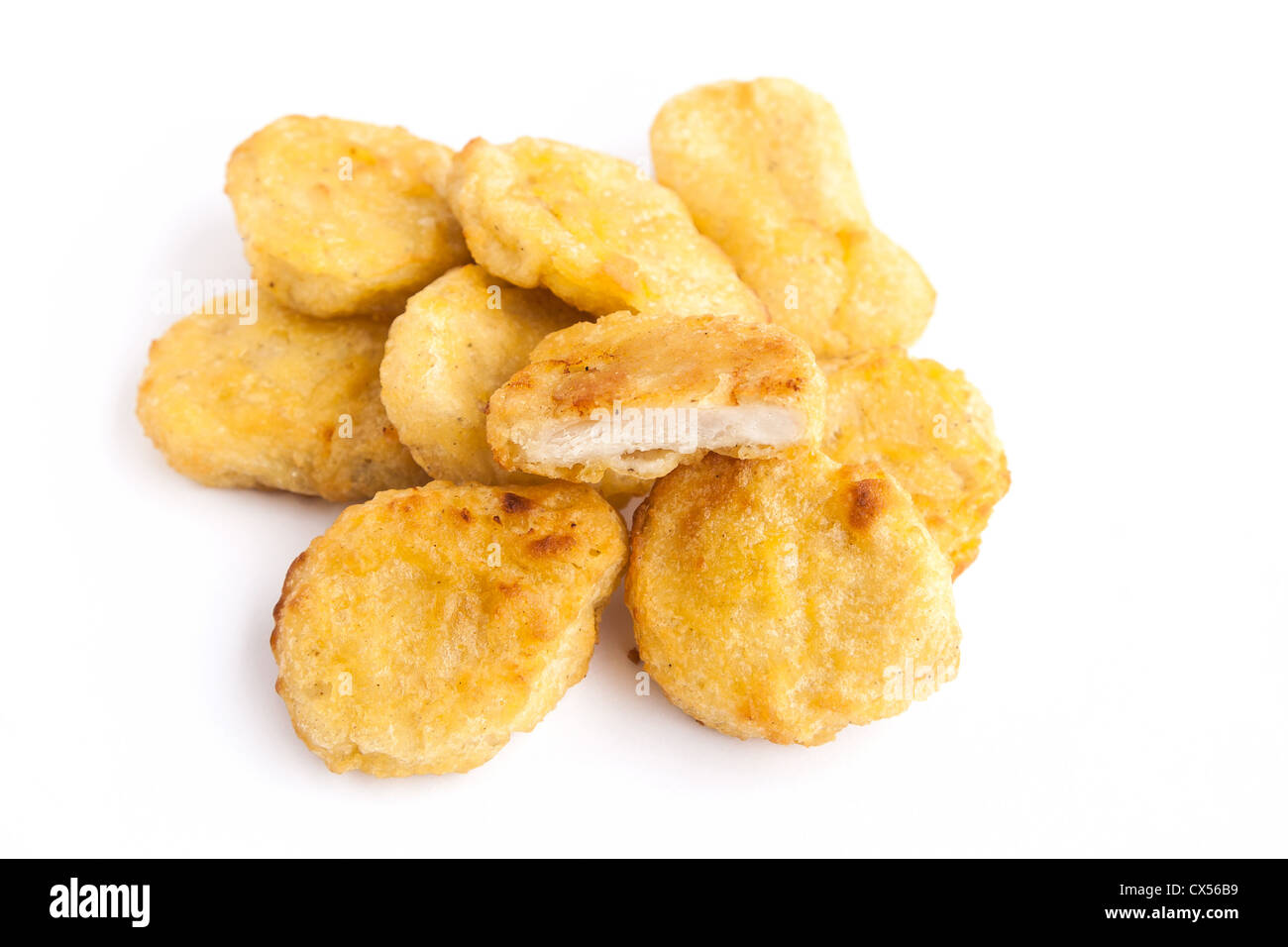 Pila pollo arrosto nugget ricca di colore giallo Foto Stock