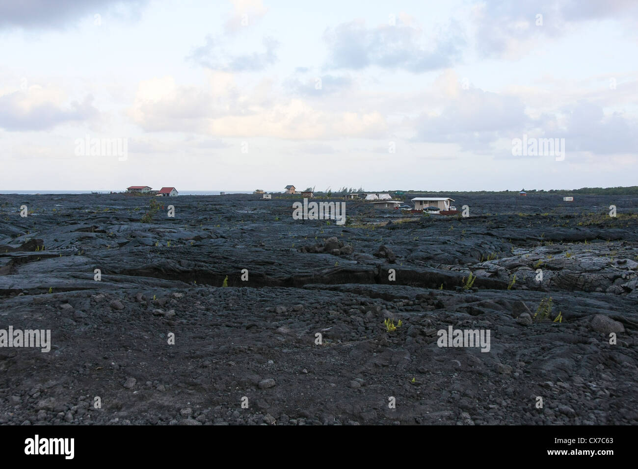 Case hanno abbondato dopo l eruzione del vulcano Foto Stock