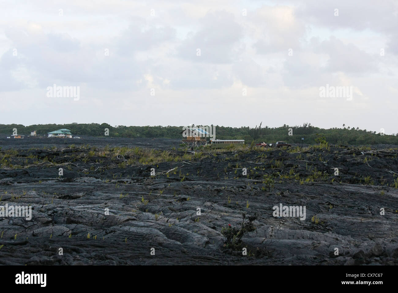 Case hanno abbondato dopo l eruzione del vulcano Foto Stock