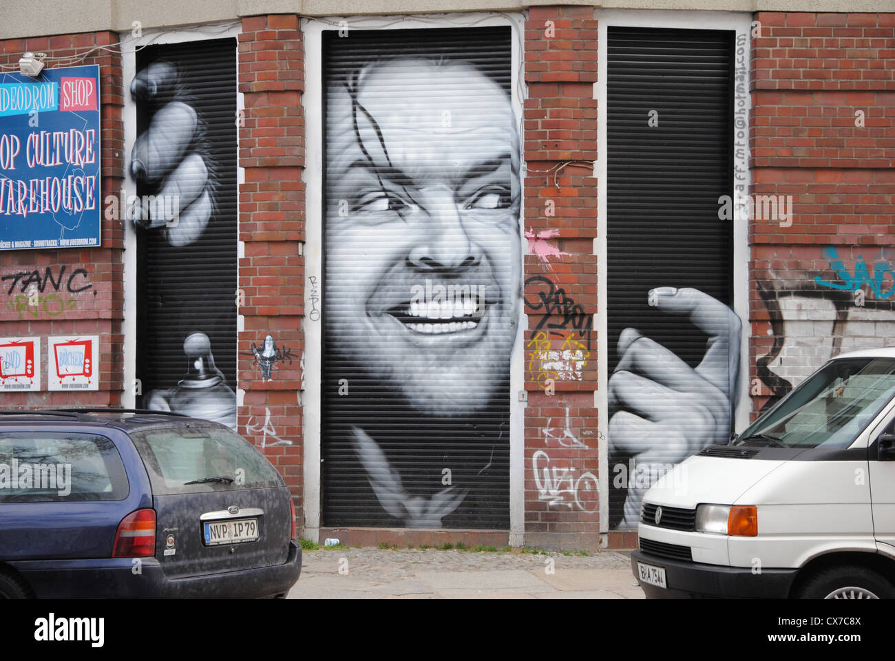 Verniciato a spruzzo murale di Jack Nicholson in Shining, Est Kreuzberg di Berlino, Germania Foto Stock