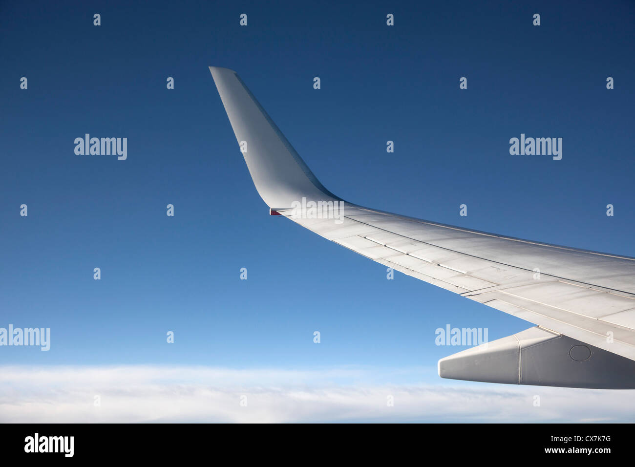 Jet sopra le nuvole Foto Stock