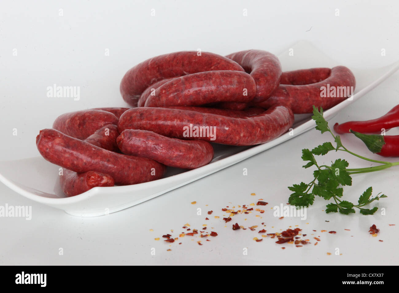 Materie Merguez una salsiccia piccante Salsiccia da Algeria e Nord Africa. Foto Stock