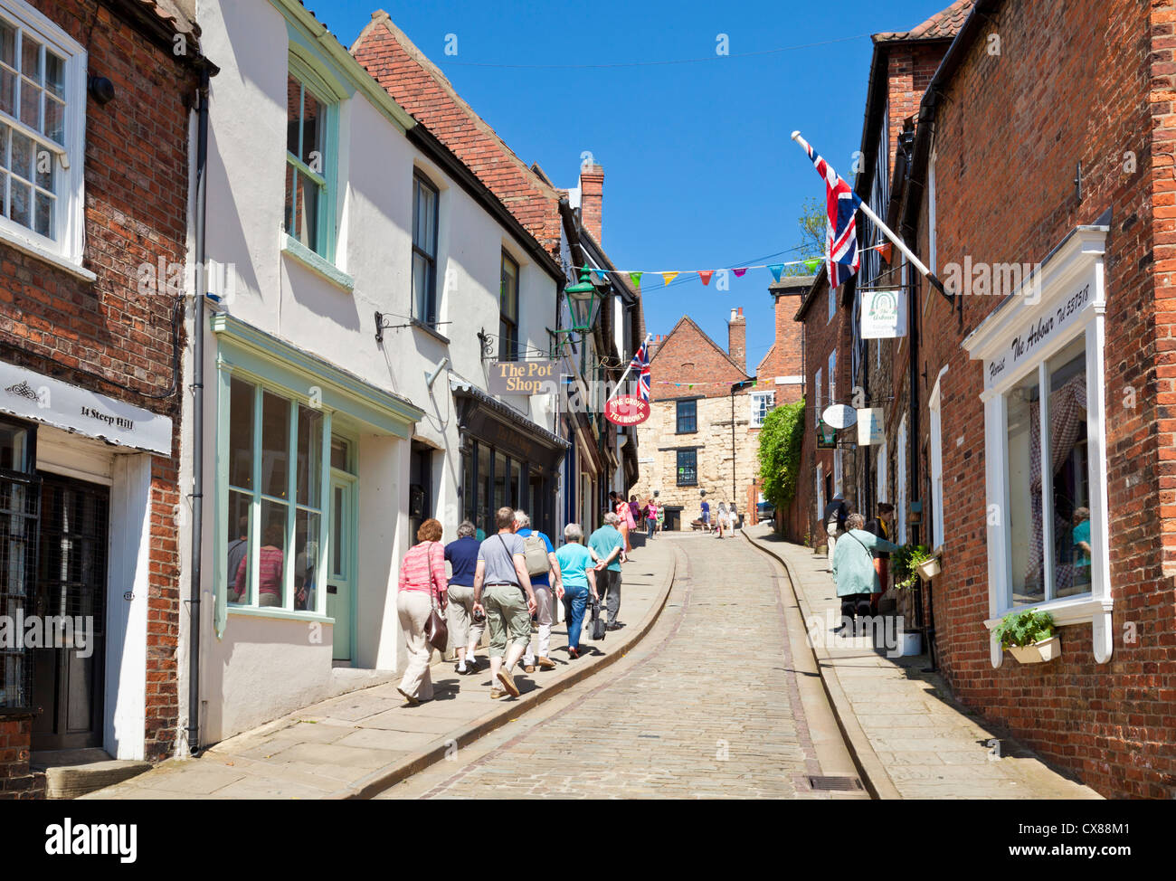 Negozi sulla ripida collina Lincoln Lincolnshire England Regno Unito GB EU Europe Foto Stock