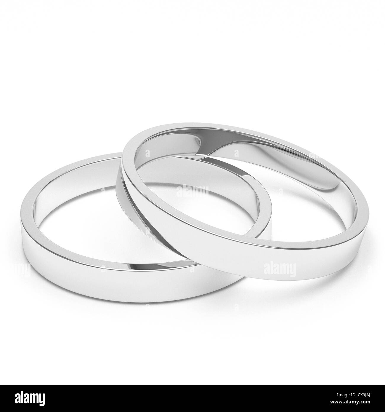 Un paio di isolati di argento o di platino anelli matrimoni. Foto Stock