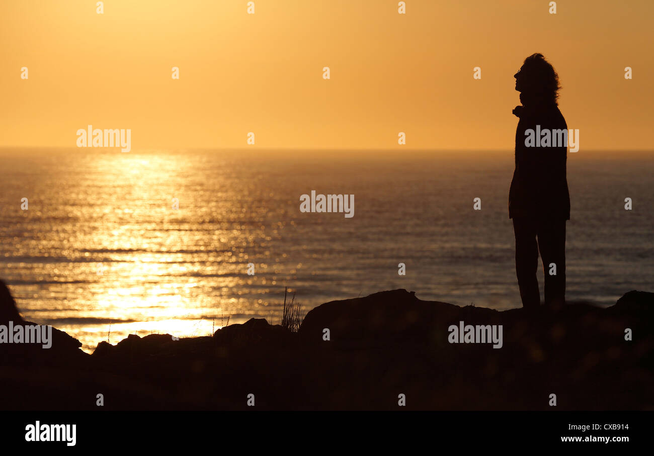 Donna Orologi tramonto, Brier Island, Baia di Fundy, Nova Scotia Foto Stock