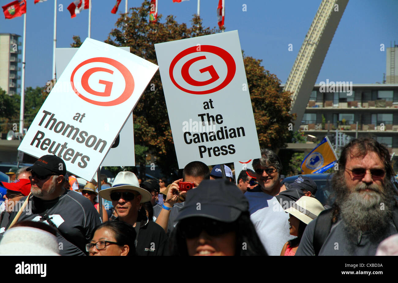 Stampa canadese di lavoratori presso la parata del giorno del lavoro in Toronto Foto Stock