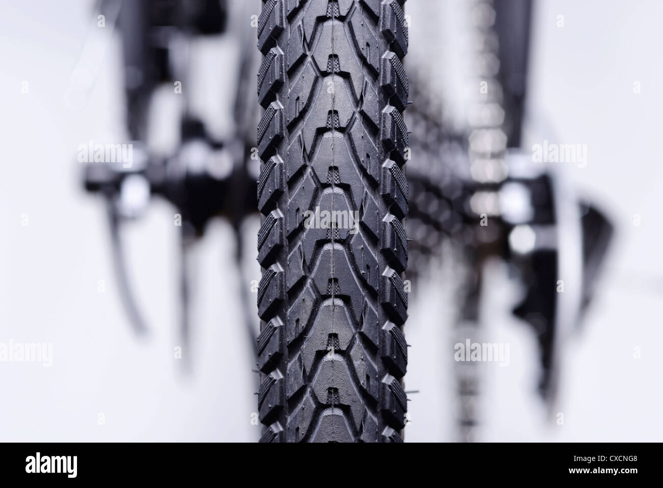 Dettaglio astratta della ruota posteriore degli ingranaggi e dei freni di una bicicletta Foto Stock