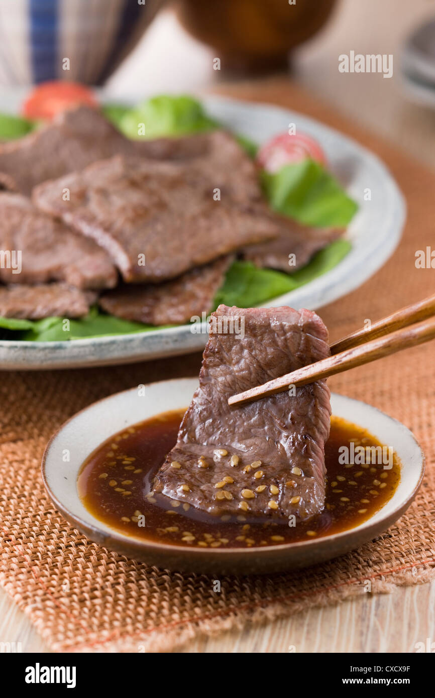Immersione di manzo arrostito in Barbeque coreano Sauce Foto Stock