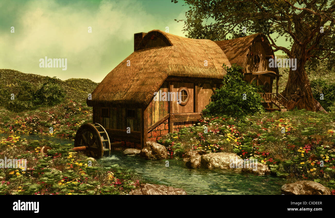 Un mulino ad acqua su un prato di fiori in Shire Foto Stock