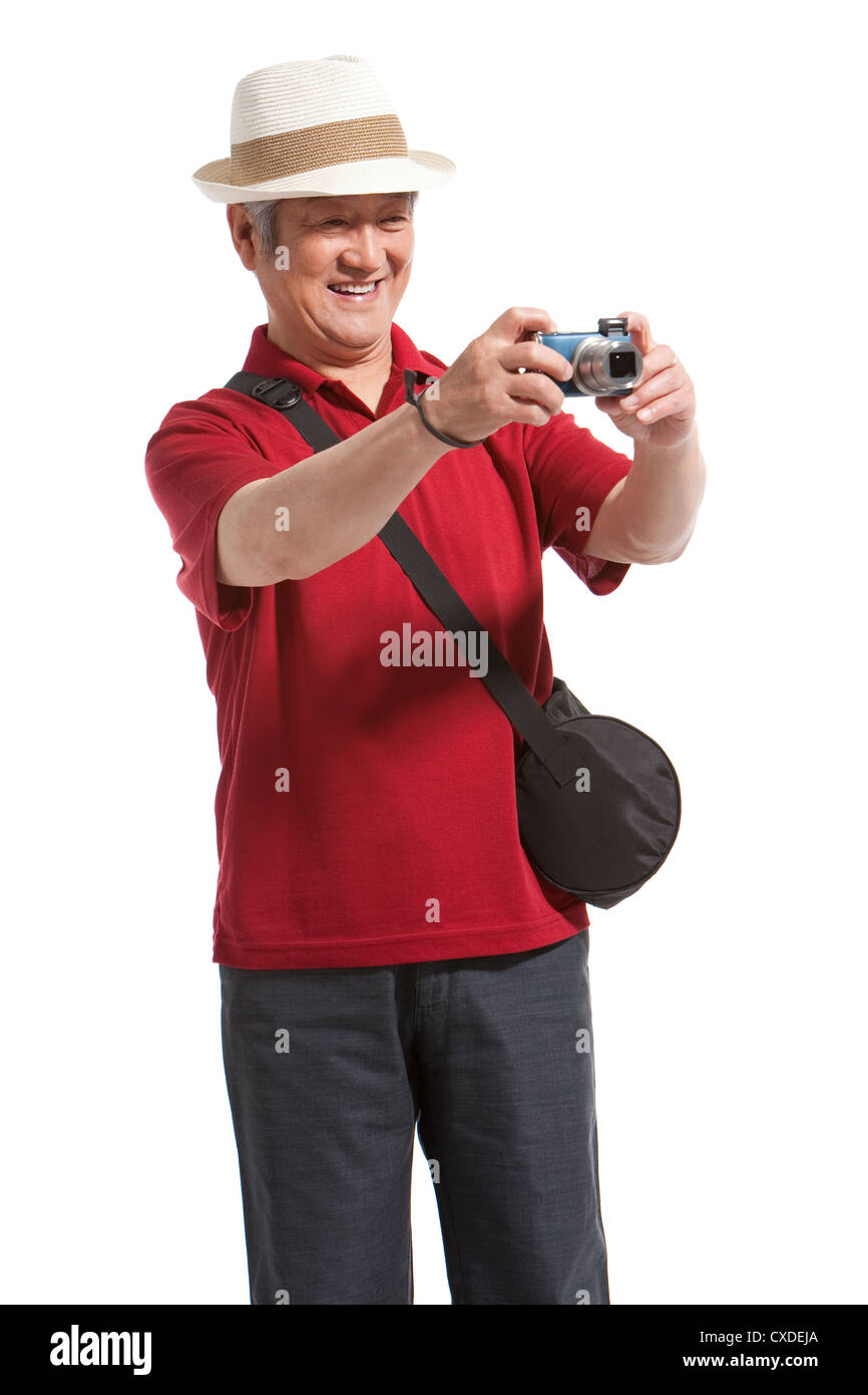 Ritratto di senior uomo con una telecamera Foto Stock