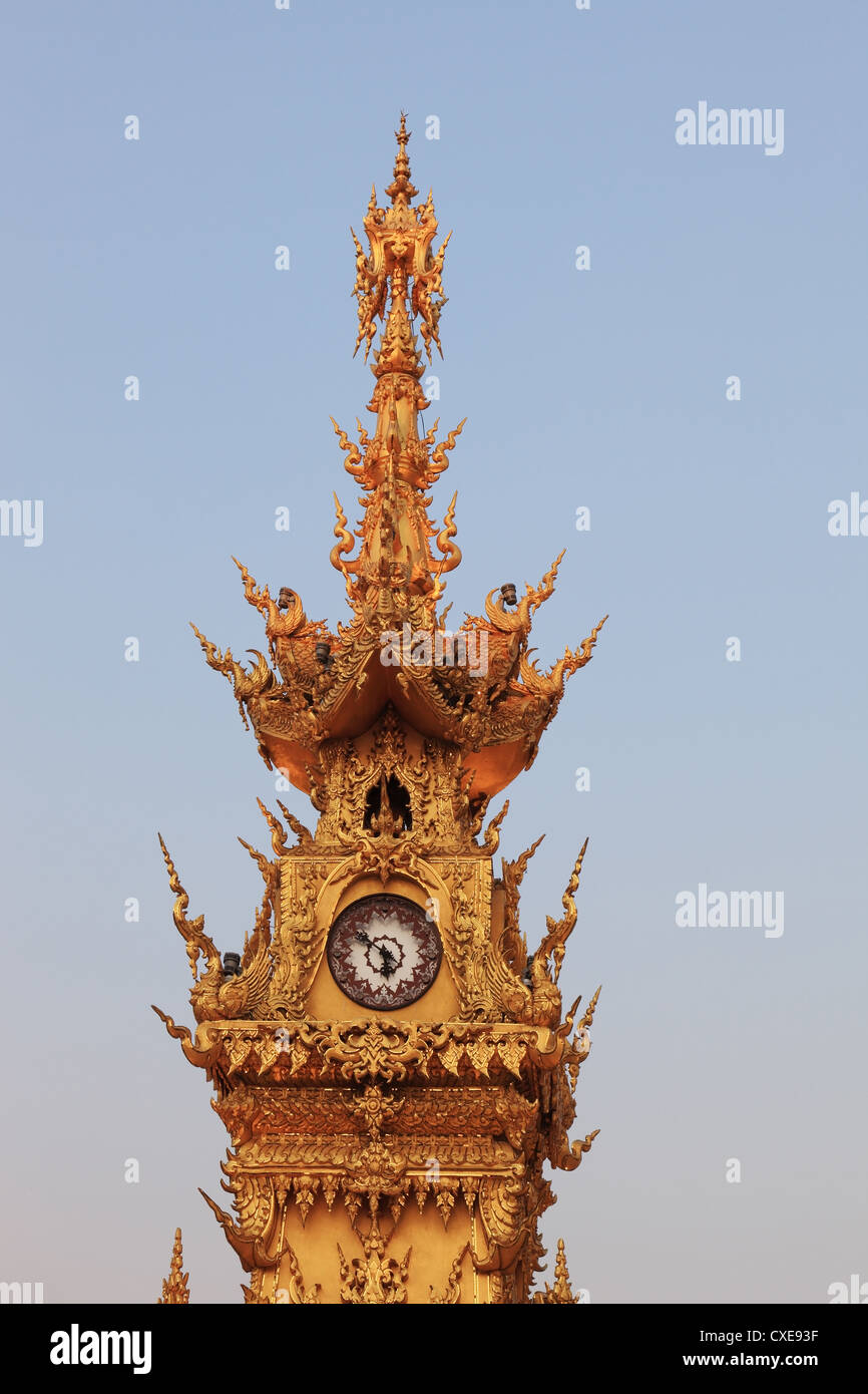 La torre dell orologio brilla al tramonto Foto Stock