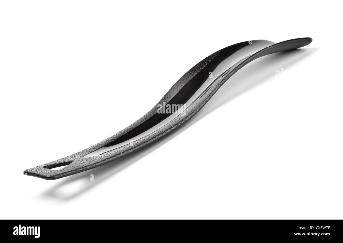In plastica nera calzascarpe Foto Stock