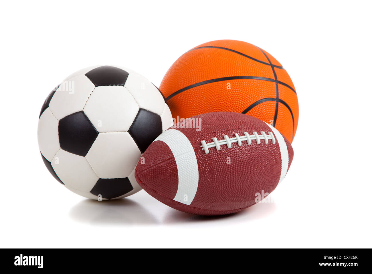 Assortiti palle sportive su sfondo bianco Foto Stock