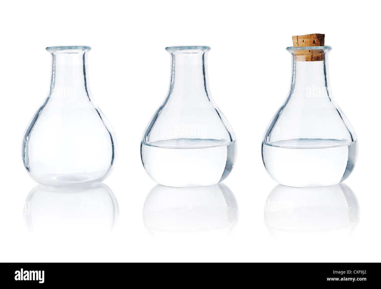 Stessa vecchia bottiglia di vetro in tre diverse fasi. Foto Stock