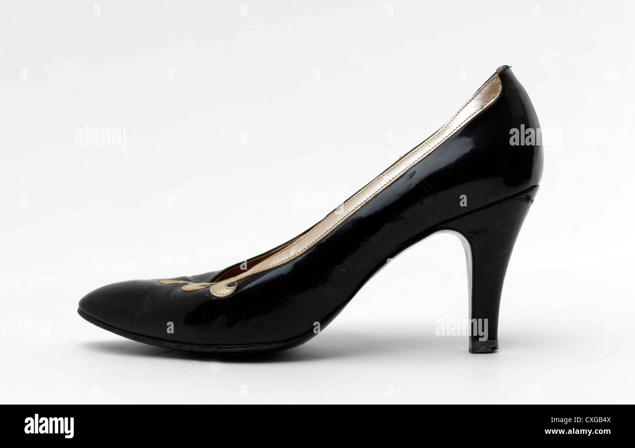 Nero e oro tacco alto scarpe Foto Stock