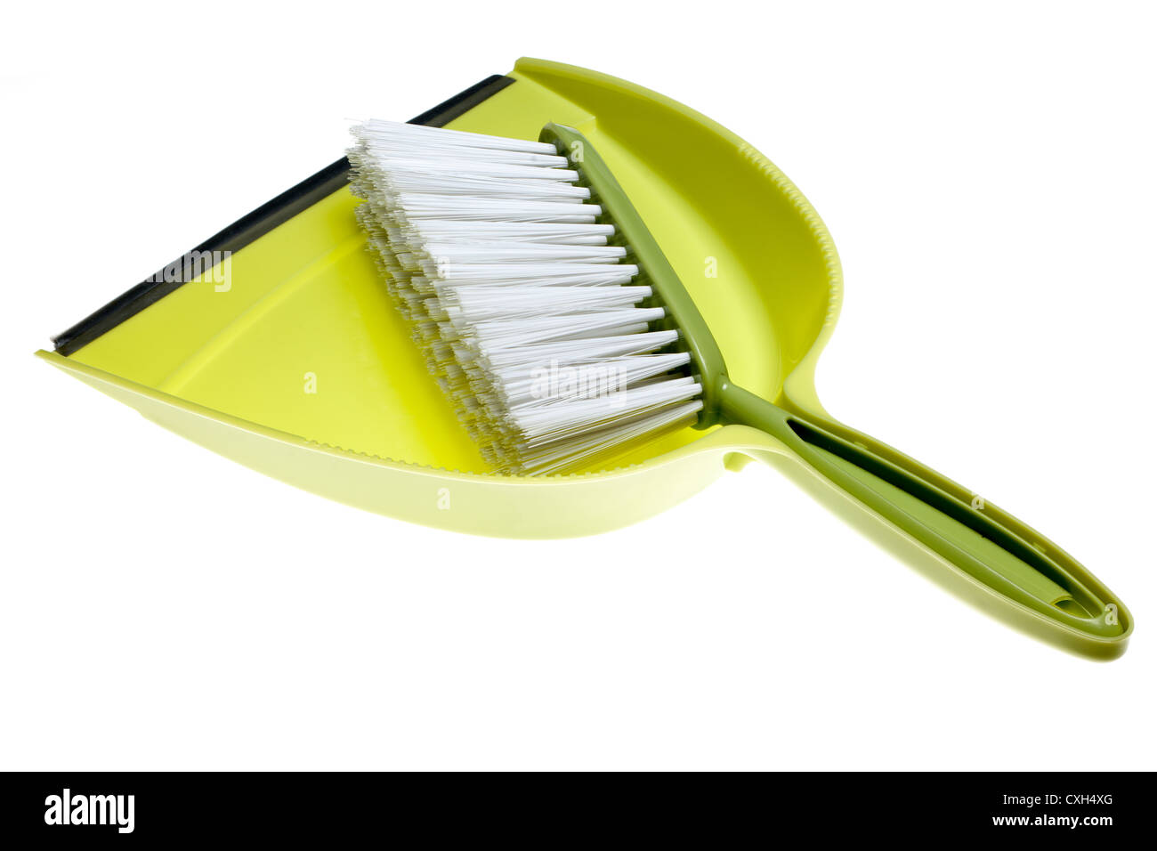 In plastica verde Paletta e spazzola Foto Stock