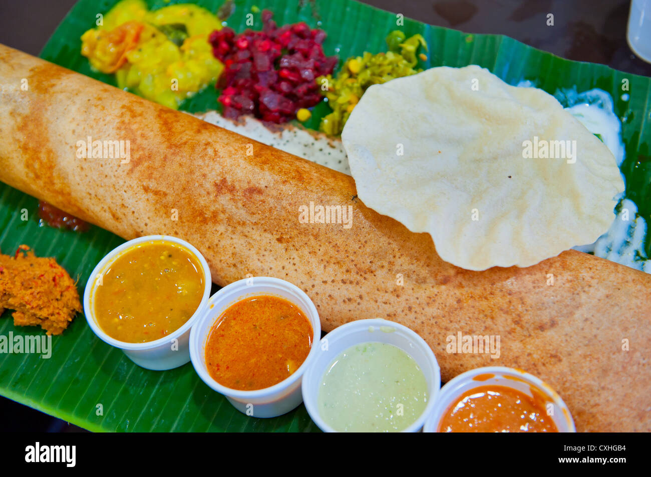 Dosa, croccante gustosi pancake dall India del Sud Foto Stock