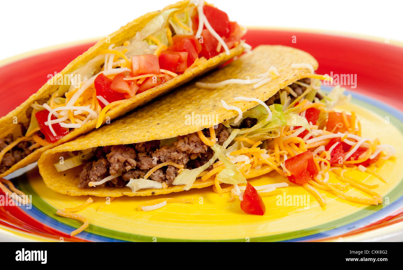 Tacos messicano su una piastra colorati Foto Stock