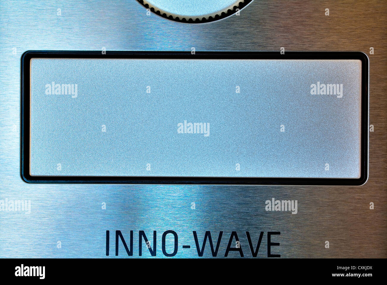 Close up di un pulsante apri dal moderno forno a microonde, immagine HDR Foto Stock