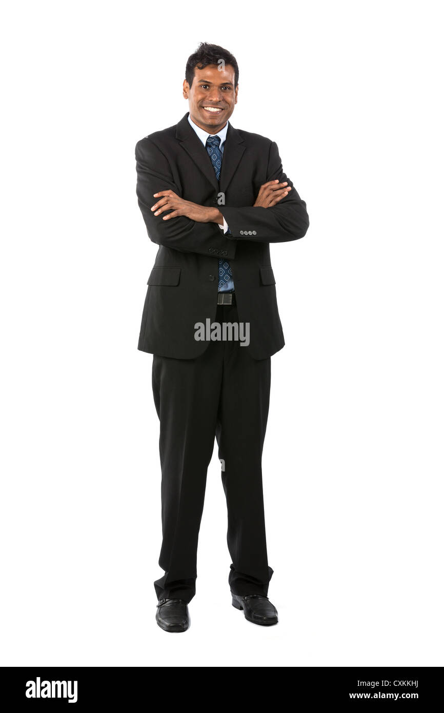 A piena lunghezza Ritratto di un indiano business uomo che guarda verso l'alto. Isolato su un bianco. Foto Stock