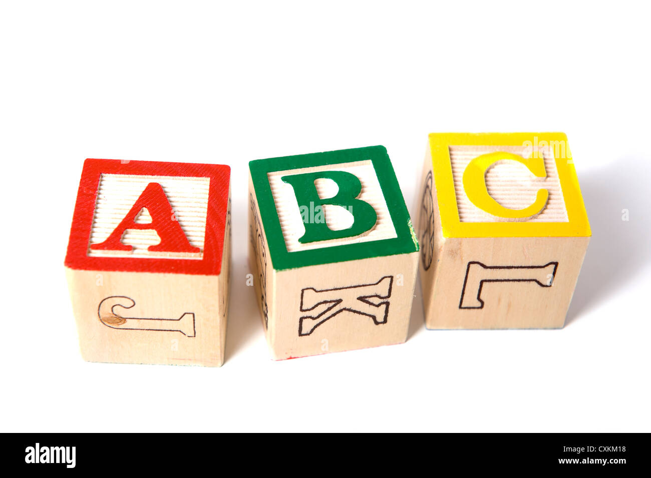In legno blocchi ABC su sfondo bianco Foto Stock