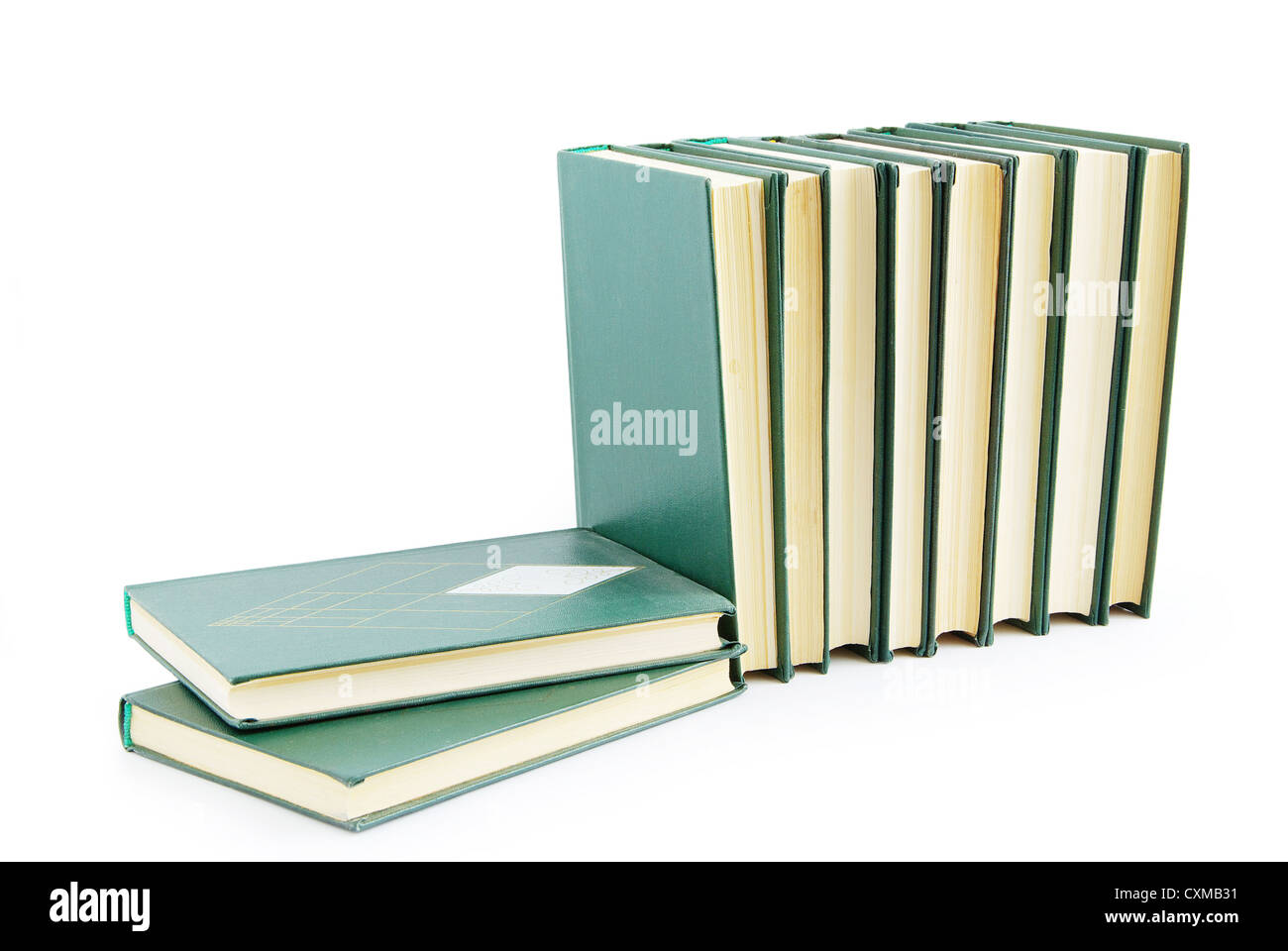 Pila di libri isolate su sfondo bianco Foto Stock