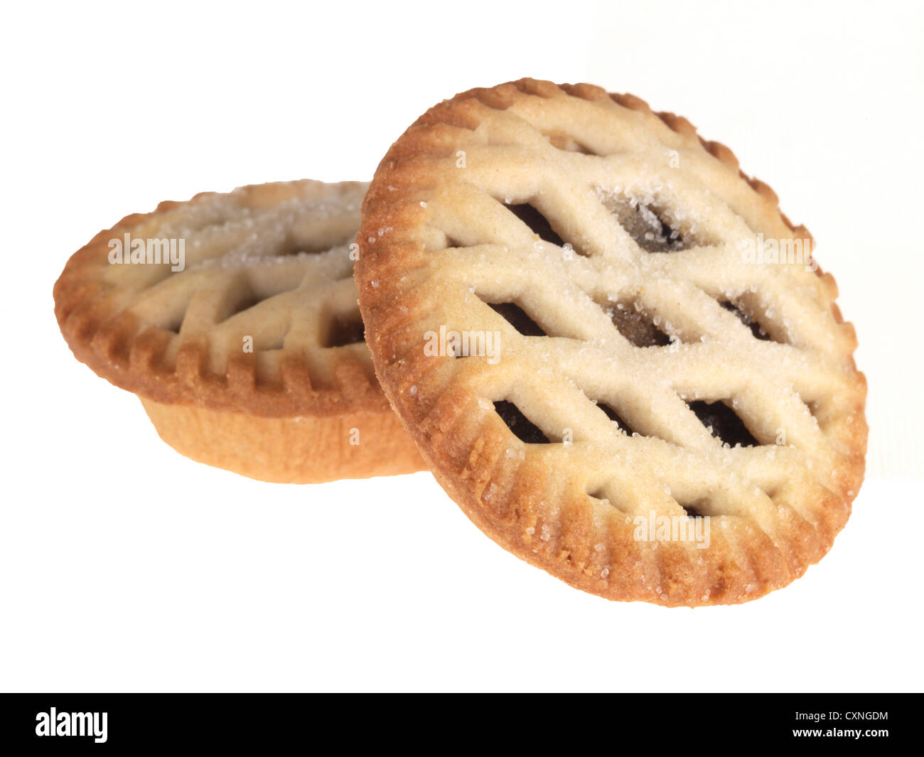 Individuali tradizionali di Natale di lusso pasticci di carne macinata in un reticolo di pasta frolla, isolata contro uno sfondo bianco, con un percorso di clipping n. persone Foto Stock