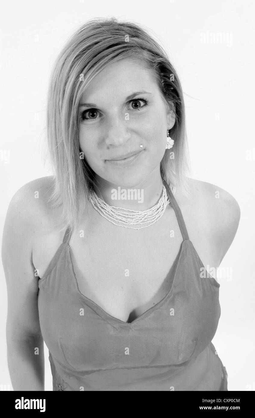 Giovane donna di moda shot con rosa top Foto Stock