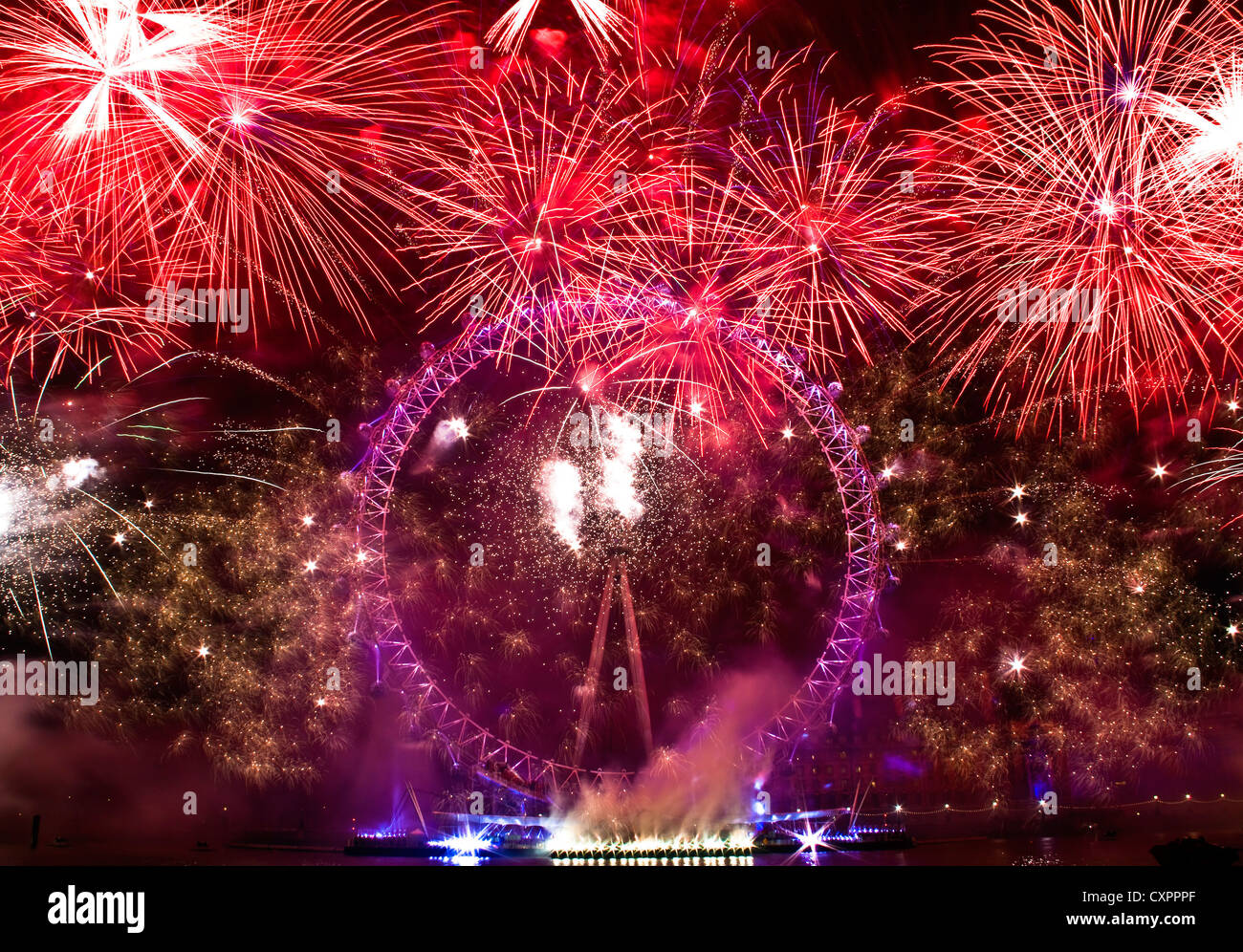 Fuochi d'artificio festosi di Capodanno nel London Eye nel Tamigi Foto Stock