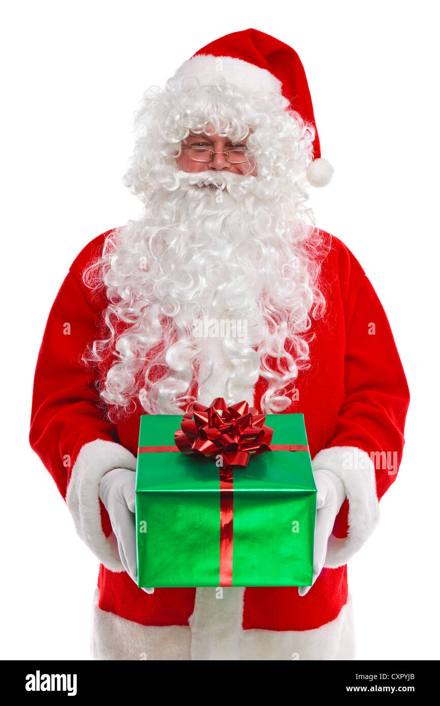 Babbo Natale ti dà un regalo di Natale, isolata su uno sfondo bianco. Foto Stock