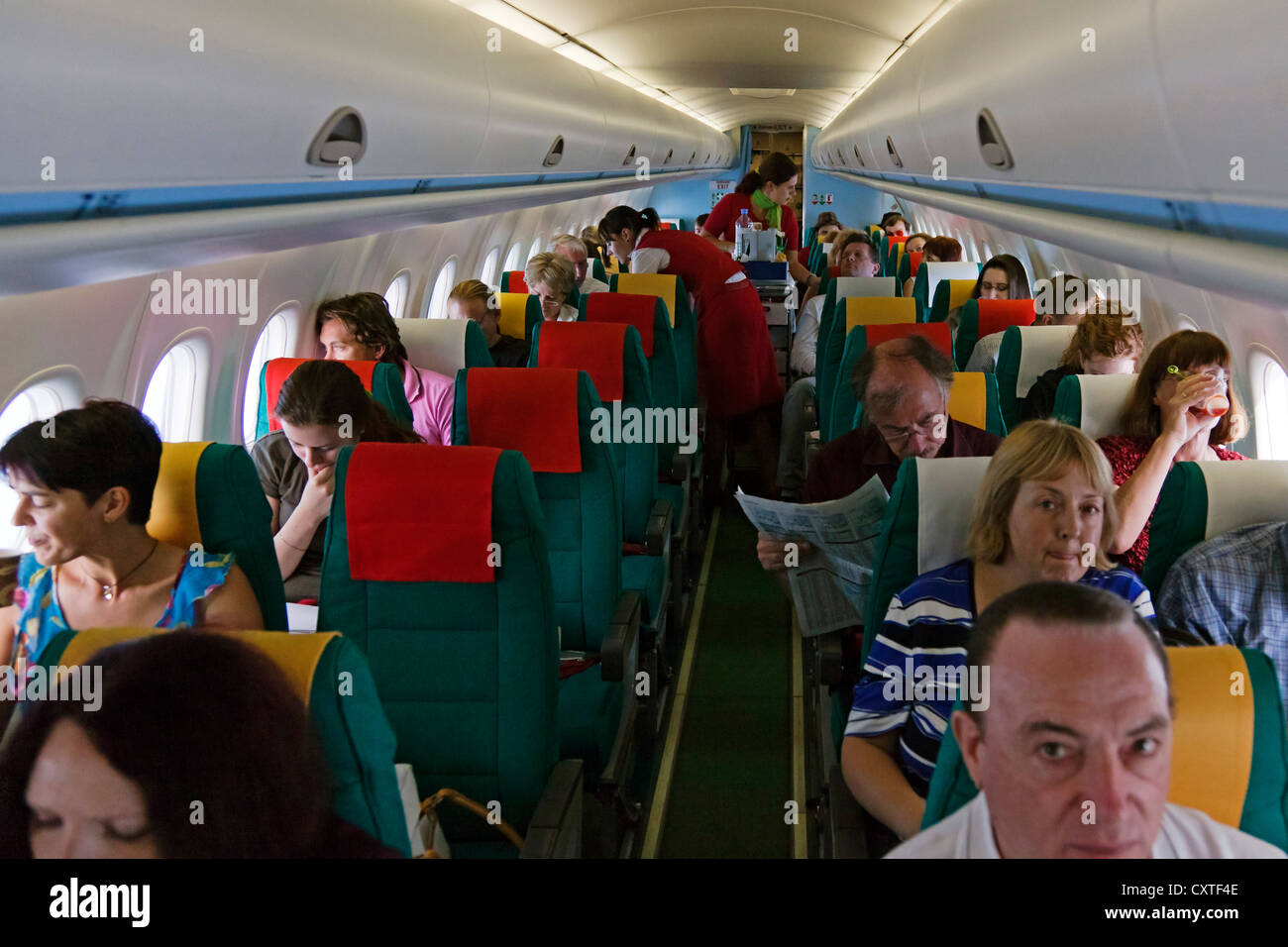 I passeggeri sul volo Austrian Airlines Foto Stock