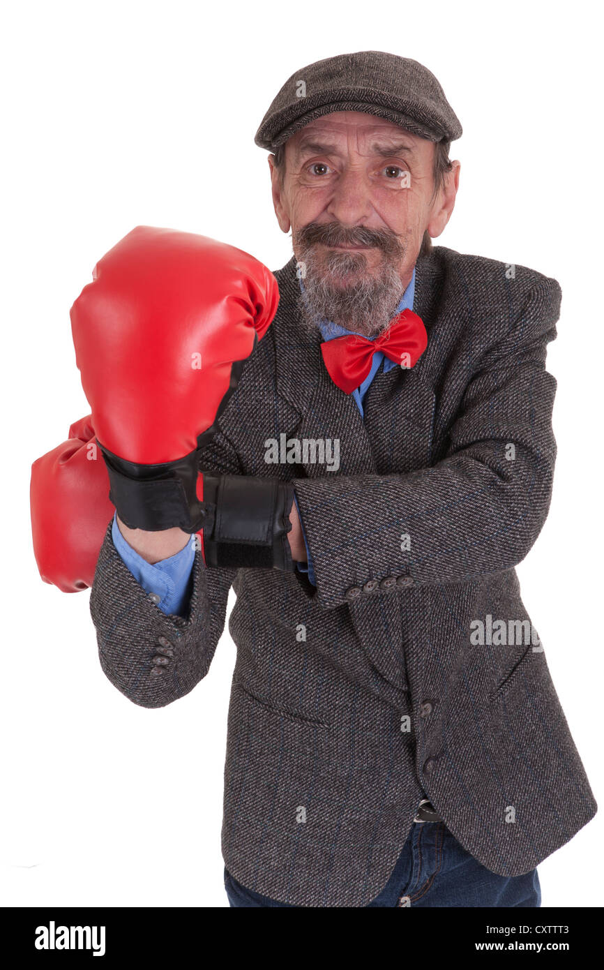 Uomo con red guantoni da pugilato indossando newsboy hat ed il filtro bow tie Foto Stock